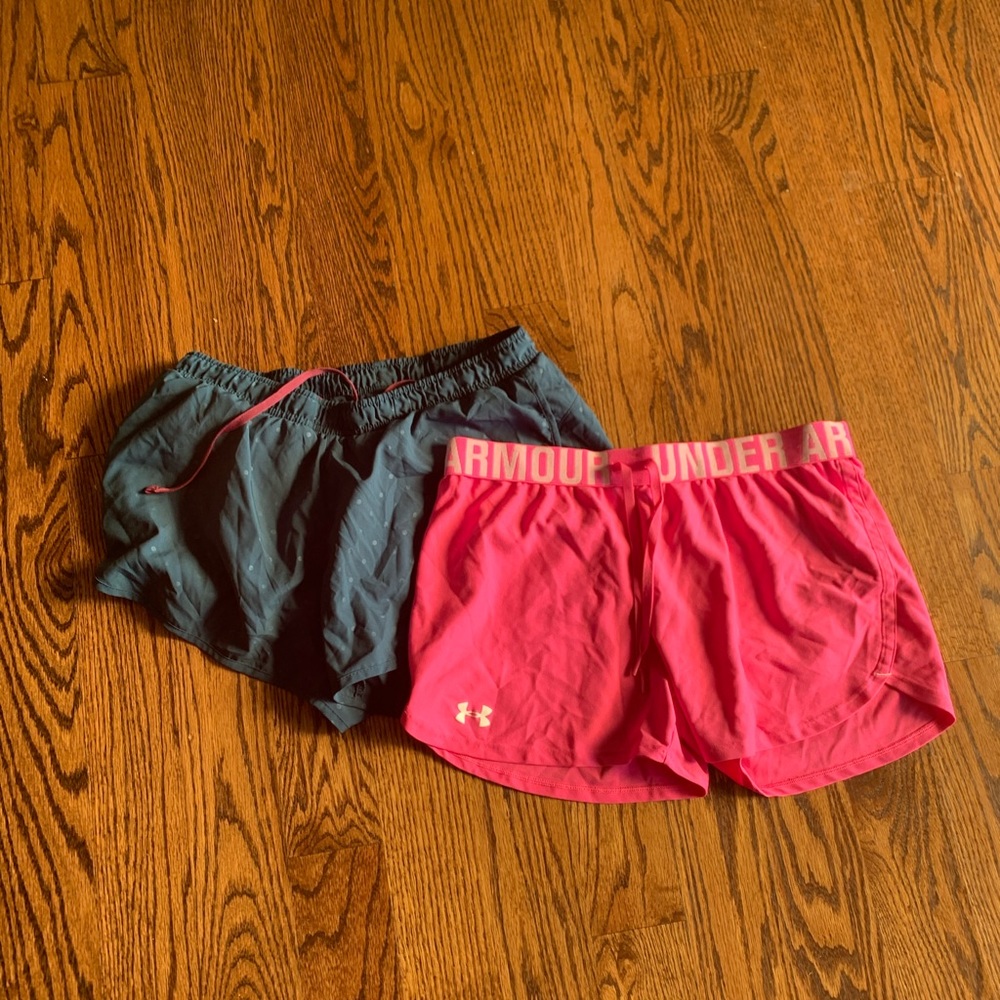 2 pairs of medium athletic shorts